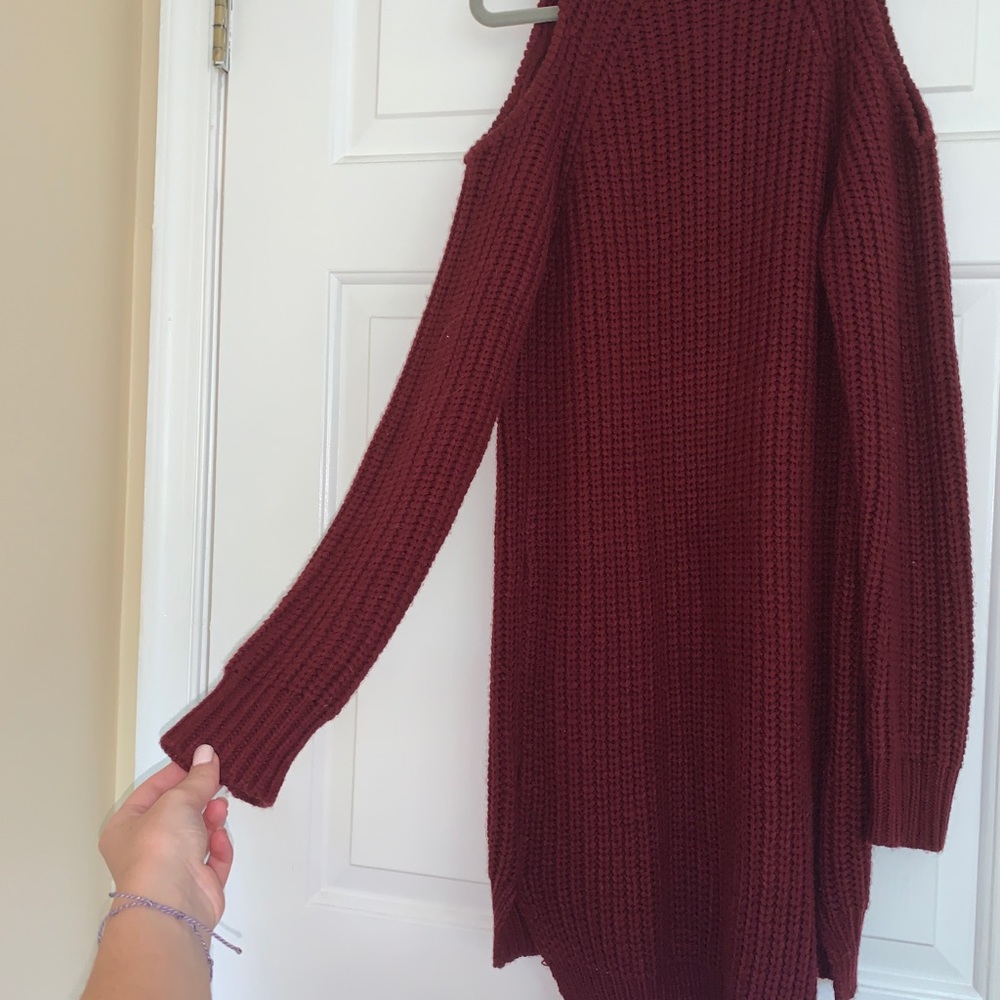 Red turtle neck, cold shoulder sweater dress.